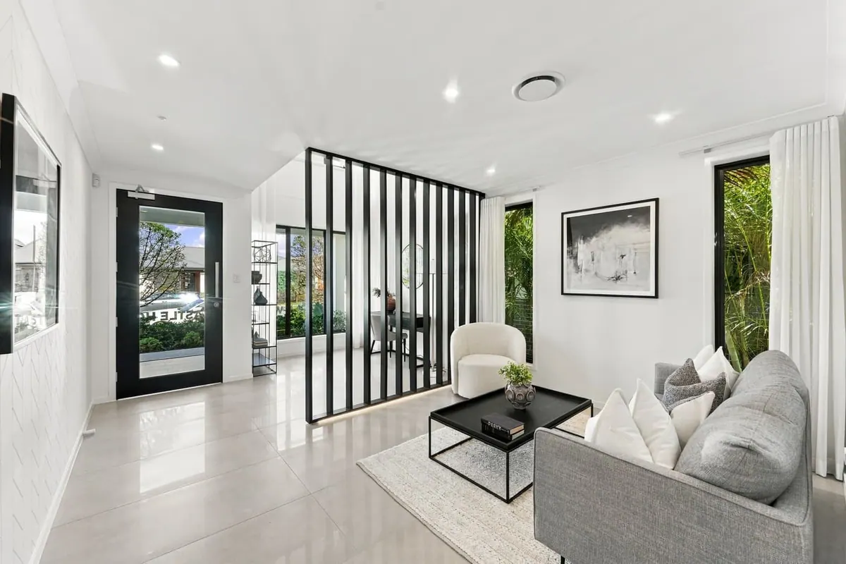 Living room with black timber slat feature wall