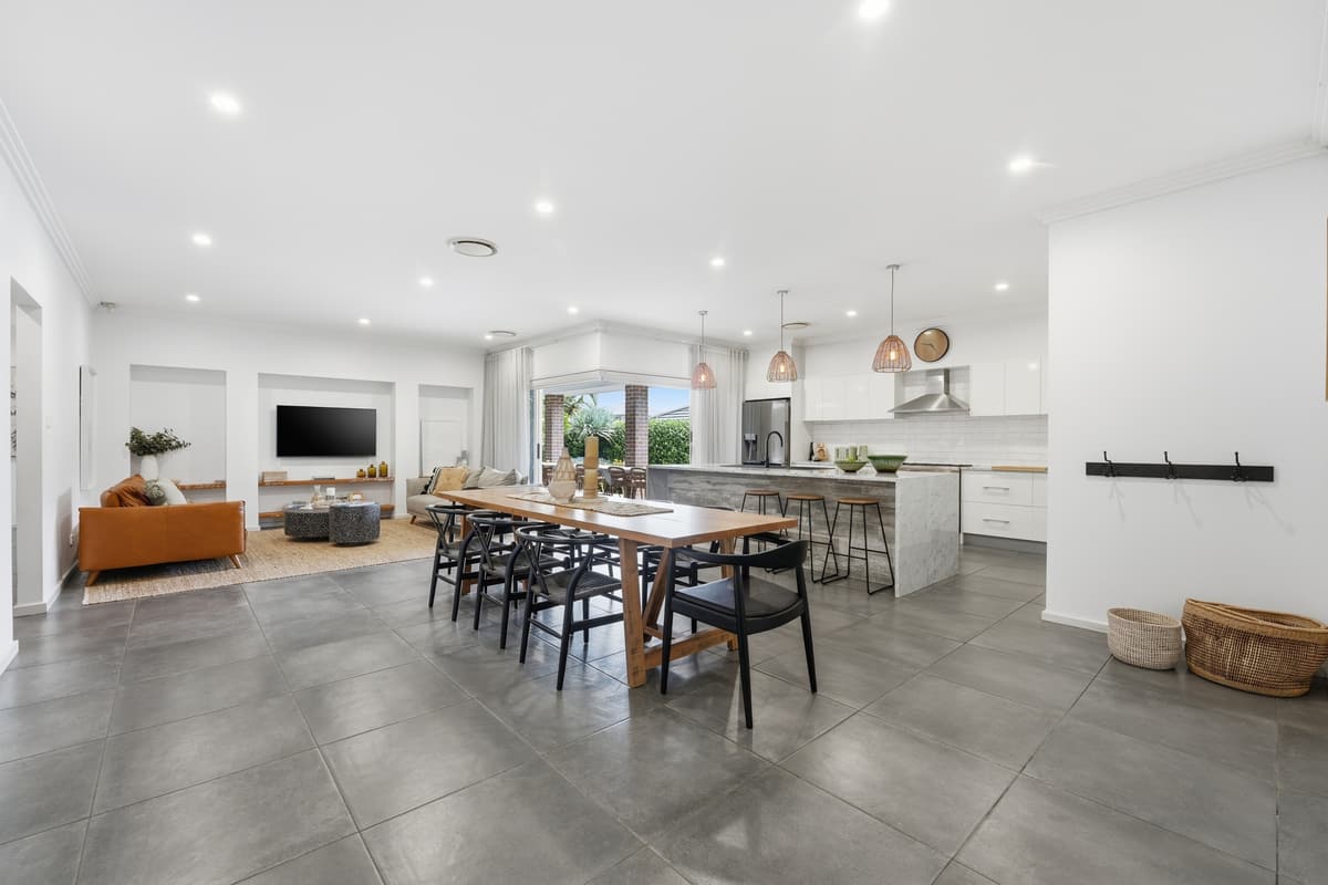 Open-plan living, dining and kitchen at Harrington Park