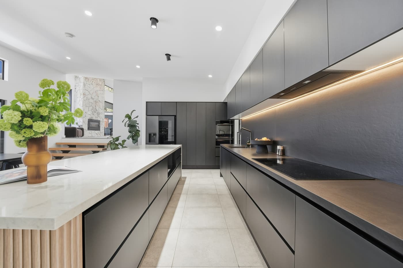 Dark stone kitchen with island bench
