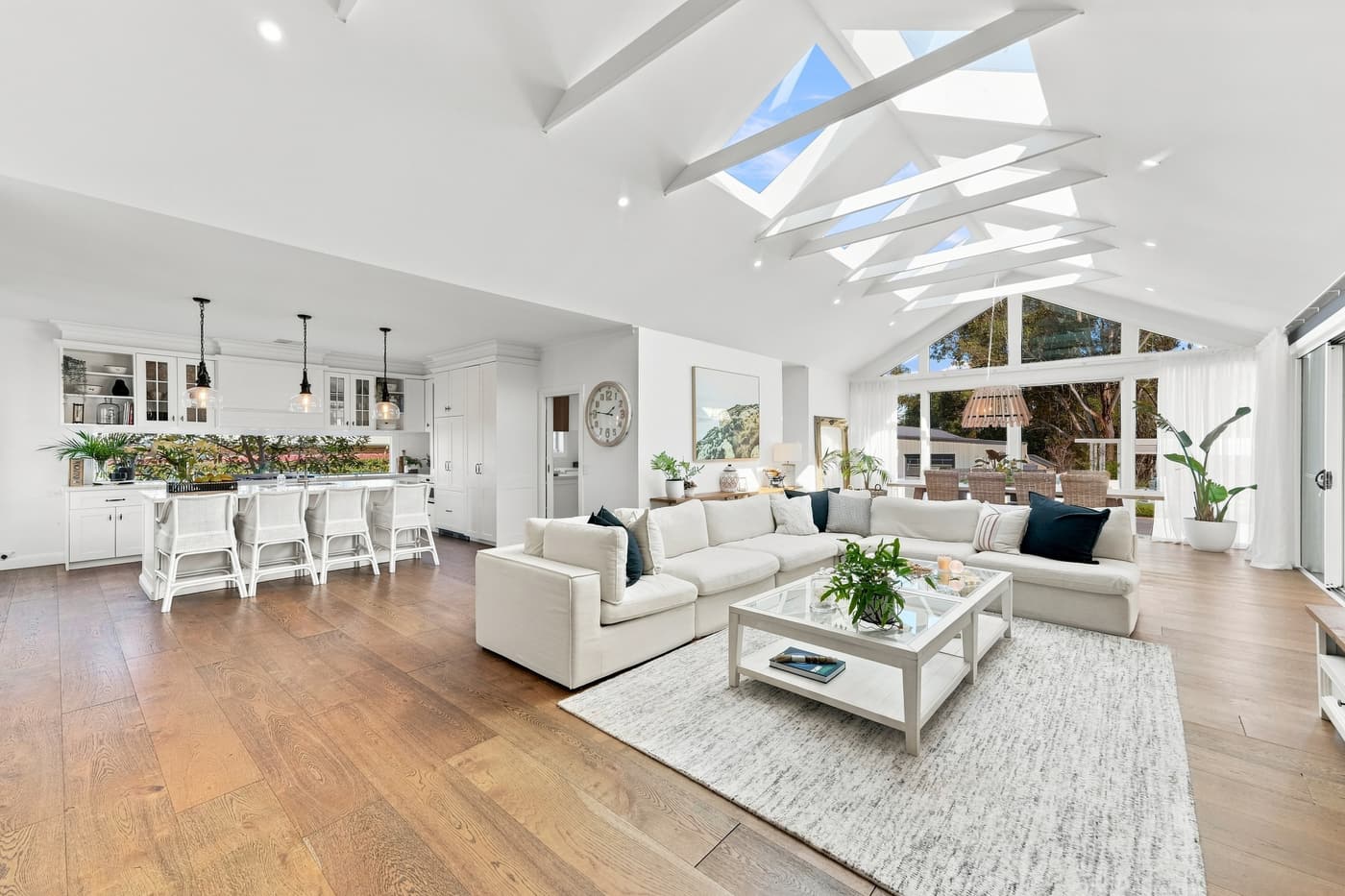 Vaulted living room with skylights
