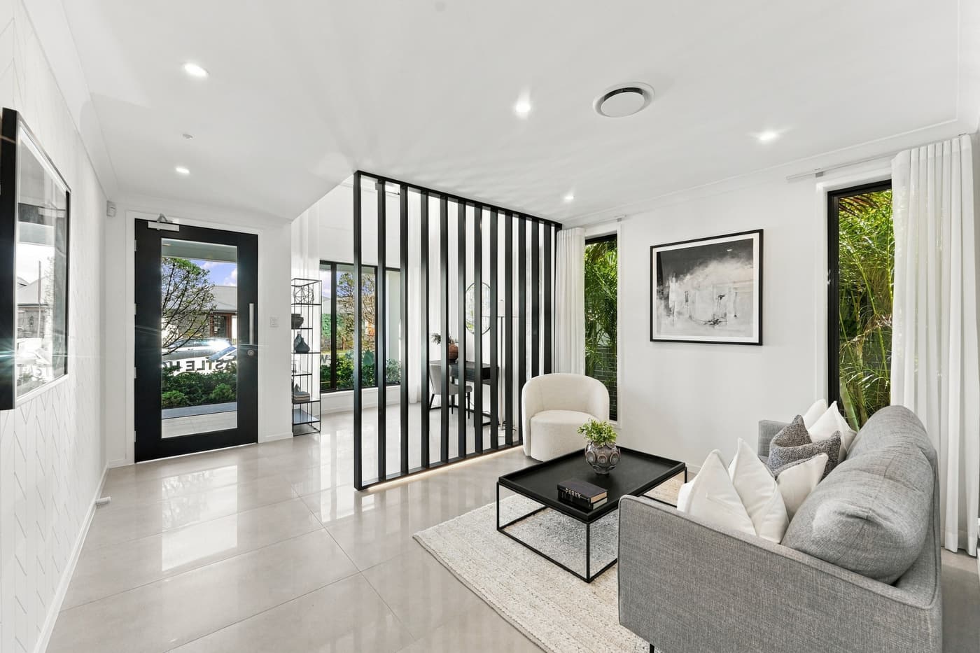 Living room with black timber slat feature wall